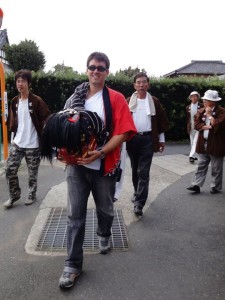Helping out my neighborhood and going door to door to perform the shishimai (lion dance) during matsuri season. 